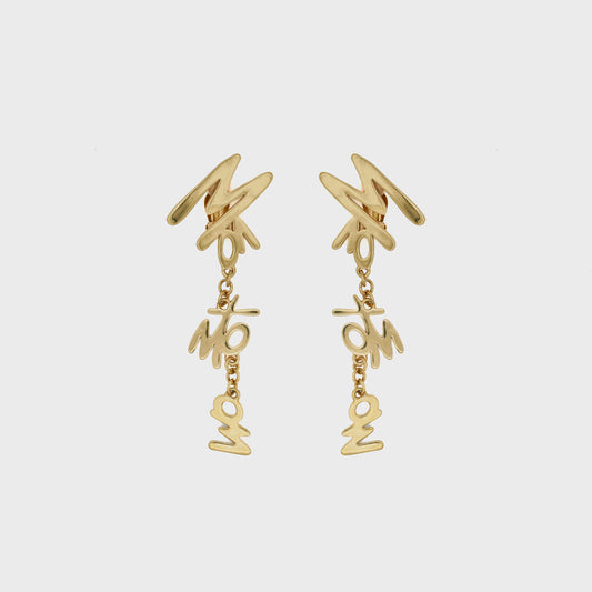 Pair of golden clips 1990 by Claude Montana